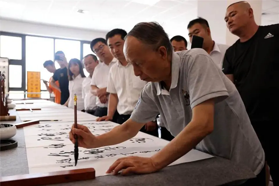 牛迈程莅临榆北煤业公司书法讲座 牛迈程莅临榆北煤业公司书法讲座